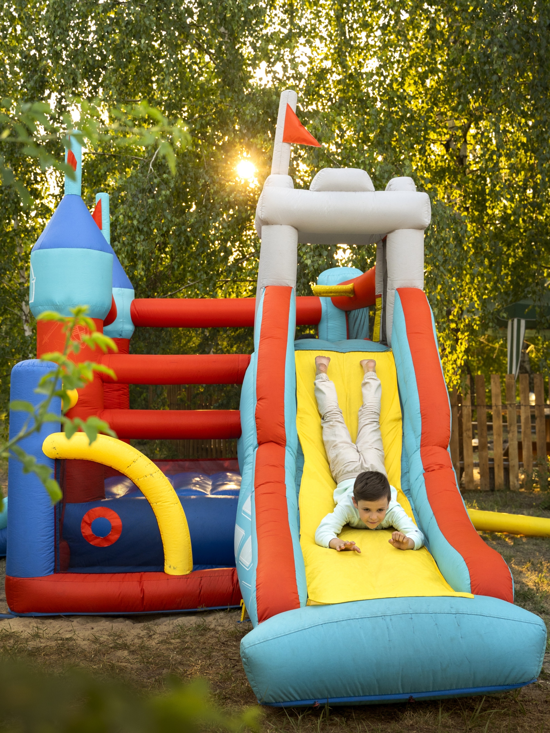 little-kid-playing-bounce-house-full-shot